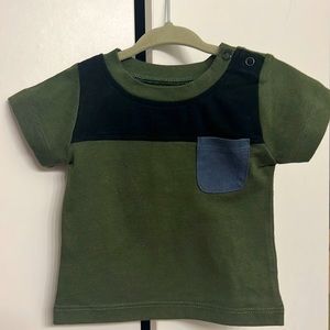 Green, black and blue baby shirt.
